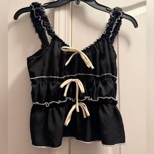 Black Sleeveless Dress with White Ties